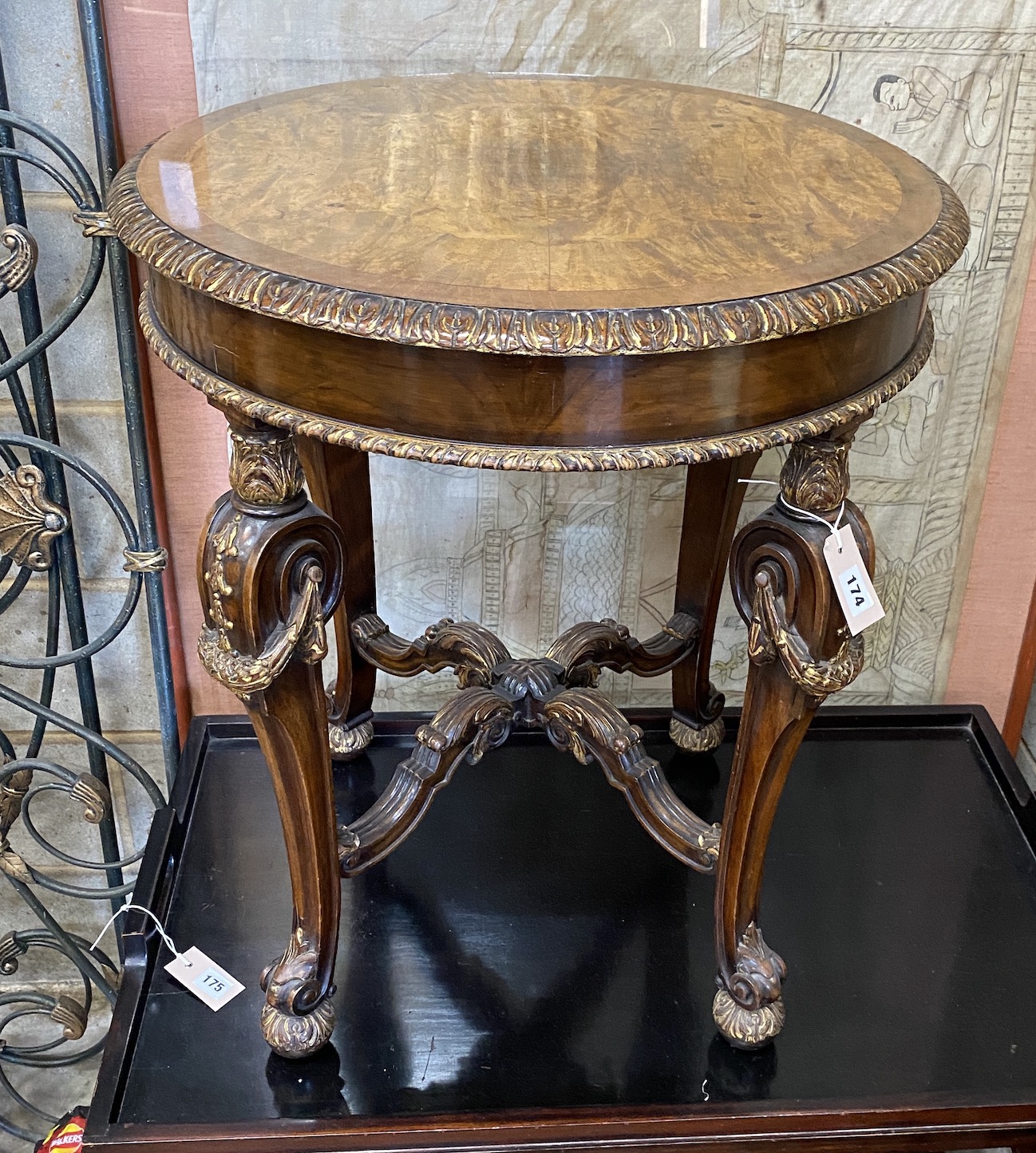 A George II style circular parcel gilt walnut occasional table, diameter 60cm, height 72cm